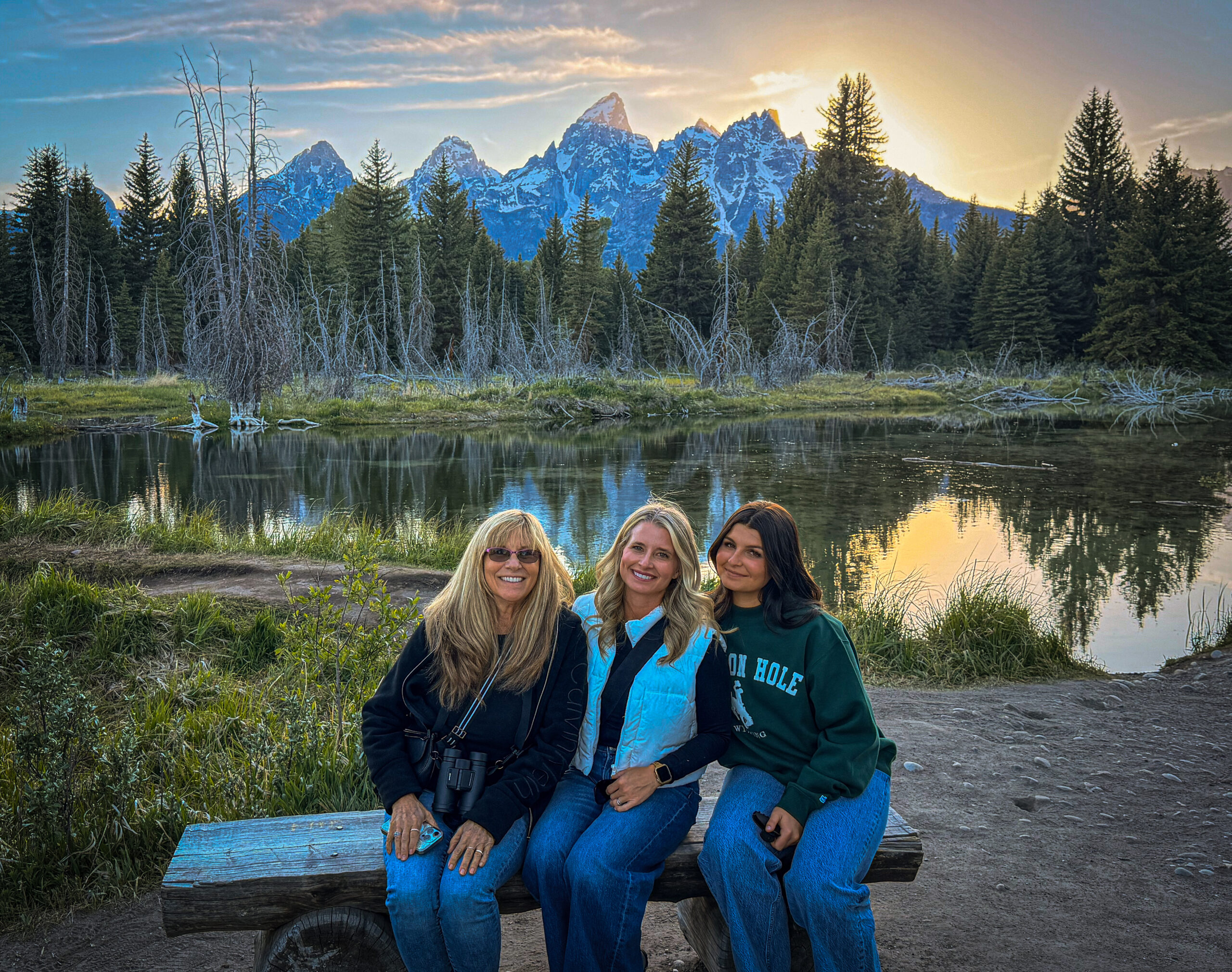 Three generations watching for wildlife near Schwabacher Landing