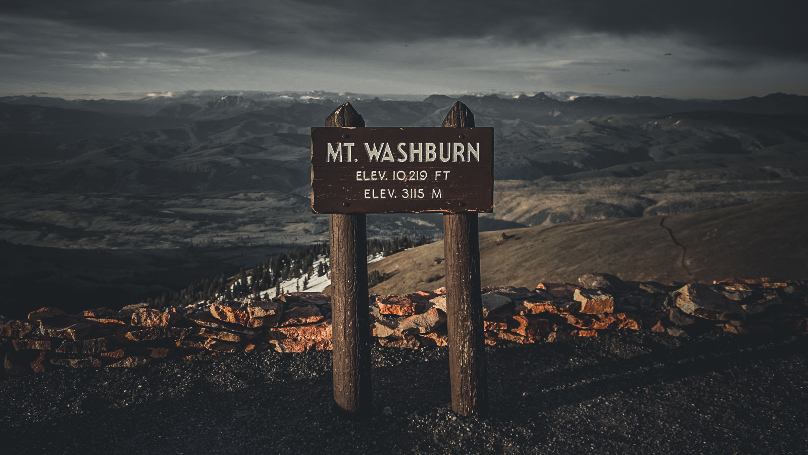Mount Washburn summit sign at 10,219 feet in Yellowstone