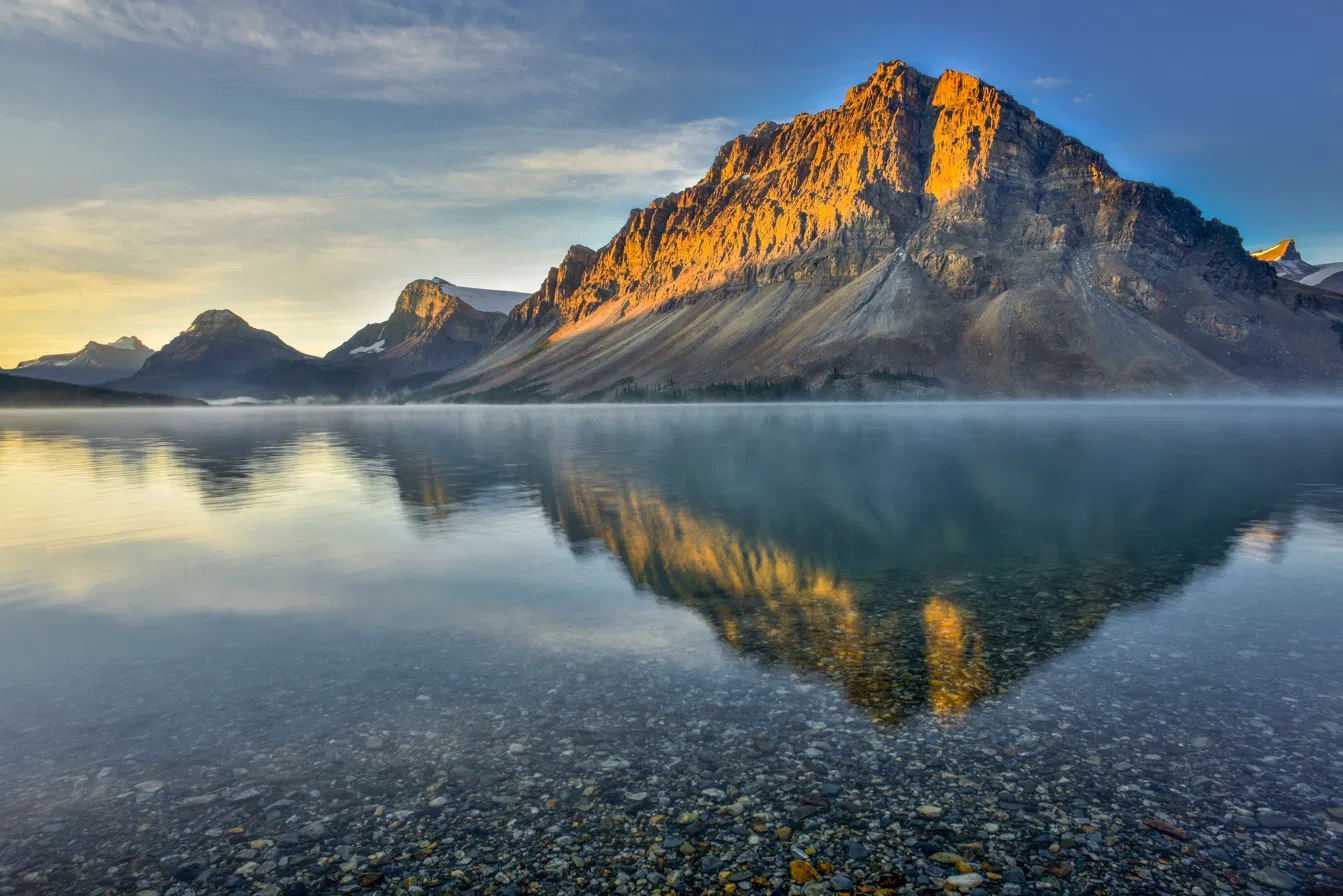 Bow Lake sunrise reflection with Crowfoot Mountain along the Icefields Parkway in Banff National Park