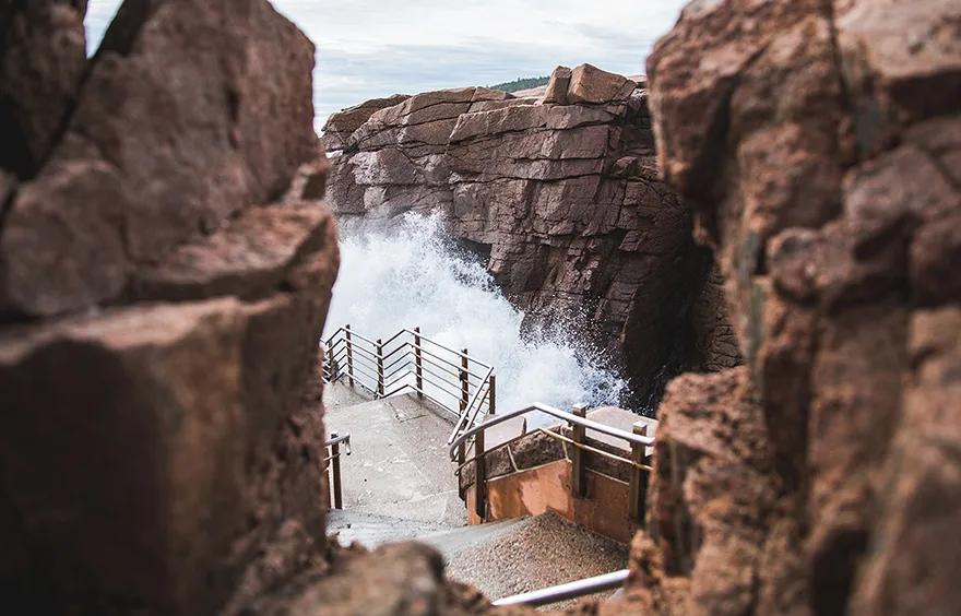 A wave bursting through Thunder Hole, Acadia National Park